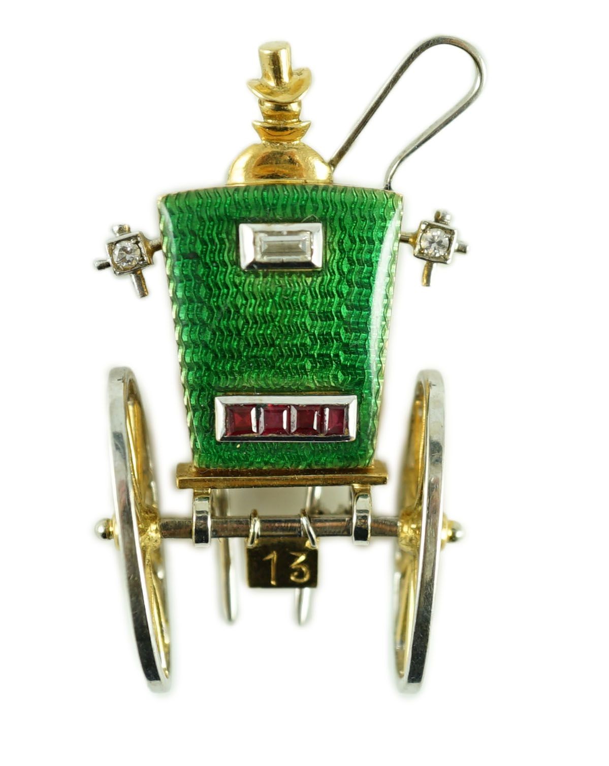 A mid 20th century Italian two colour 18ct gold, green enamel, ruby and diamond set novelty clip brooch, modelled as the rear view of a carriage with driver